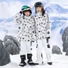 2023 Neue Kinder Thermals Skianzug Jungen Mädchen Ski -Jacke Hose set winddichte wasserdichte Snowboardkleidung Schnee