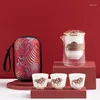 Teaware -sets 2024 Chinese draagbare theeset keramiek 1 pot 2 kopjes reismokken opbergzak warmte isolatiecontainer