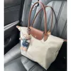 2024 Новое с плечевым ремнем складываемой торговой сумки, дамы, пакеты дизайнерские пакеты Messenger Multi -Color Suppling Bag Bag 10a