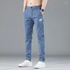 Pantalon masculin élastique élastique mince décontractée douce coréenne coréenne coton extensible des affaires de commerce masculin gris boussière bleu