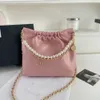 Diseñadores de bolsos vendedores calientes bolso popular versátil nueva cadena de cuadrícula Crossbody cubo