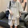 Koreańskie mody waflowe Zestaw Set Summer Short Sleeve Top Shorts Sportswear Trendy Tracksuit 2 sztuki Druku