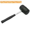Zwarte rubberen hamer niet-elastische tegelhamer met ronde kop en niet-slip houten stalen handgreep klein doe-het-zelf handgereedschap