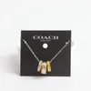 Collier de canapé de concepteur Collier quotidien accessoires C Series Classic Logo Émail Émail glacé Round Donut Three Ring Collier Four Color