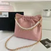 Diseñadores de bolsos vendedores calientes bolso popular versátil nueva cadena de cuadrícula Crossbody cubo