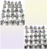 Lot en vrac entier 100pcs styles top mix bancs de crâne squelettes bijoux men039 cadeau de cadeau favori des hommes de biker marque de bijoux homme 6394270