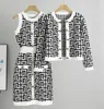 Robe de deux pièces pour femmes Pluls de luxe Chandails à manches longues Cardigan Designer Sweater Tabar Top Robes Ensembles