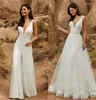 Robe de mariée 2 en 1 combinaison avec jupe détachable deux pièces robes de mariée pantalon pour femmes en dentelle en tulle vneck