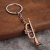 Anneaux clés Musique Small Gift Men and Women Keyrings Mini Retro Musical Instrument Metal Keychain Pendant 240412