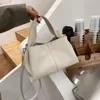 Bolsas de cintura nicho francês Khaki Bag Bucket Spring/verão 2024 Bolsa de moda versátil Ins simples Ha simples feminina