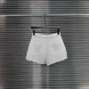 Kvinnors shorts designer 2024 tidigt vår Ny Nanyou cha mode mångsidig bokstav broderad metallkedja diamantnät tvätt denim t1mw