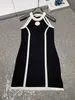 Nouveau 2024 Été blanc noir fleur noire Lady élégante robe à tricoter