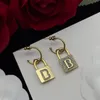 Orecchini con lucchetti d'oro Hoops Stalloni di design Retro Earring Women Diamond Jewelry SP2 Fashion Luxury Letter Hoop Vintagearings MENS EARGINE CYD24040902