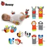 Sozzy 4pcs zachte baby speelgoedpolspol sokken schattige cartoon tuin bug pluche rammelaar met ringbel b9422993282