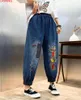 女性のジーンズ秋の女性フローラル刺繍パッチファッションデニムハーレムパンツルーズで多目的なストリートウェアエラスティックウエストビンテージズボン