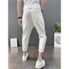 Japanska trender Mens Ripped Hole Jeans White Green Black Ankle Längd Youth Fashion Loose Denim Harem Cargo Pants 240328