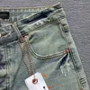 Lila Marke Denim Shorts mit amerikanischen Grandkanten und Löchern gelbe Schlamm -Denim -Shorts gewaschen