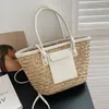 Axelväskor 2024 Summer Woven Bag Women Vintage Casaul Shopping Tote Top Handväskor Designer Beach Straw Handbag Ins