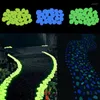 Estatuetas decorativas 25/50pcs Fluorescência Pedras luminosas seixos brilhando em pedra artificial no evento Dark Wedding Party Supplies