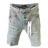 Purple brand denim shorts with American burr edges and holes washed yellow mud denim shorts