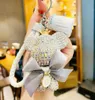 20 pcs mode mignonnes femmes039s Bagcar Keychain Pendant Highend Handmade Swined Couir Hands Sac à main chaînes Tassel Rodeo Crystal 9186949