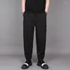 Pantalones de hombres High Street Black Male Versión coreana de Feet Bunched Haren Jóvenes All the Trend Plankton Handsome Casual