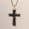 Colliers pendants Collier de croix de lave noire rétro européenne pour hommes