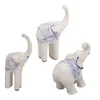 Figurine decorative decorazioni in ceramica elefante salvo squisito durevole scultura di porcellana elegante abbellire lo spazio per ufficio di ingresso