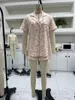 Abbigliamento per la casa Donne Set di pigiama Stampa Shirt a bottone a manicotto corto a manicotto con cortometraggi set da sonno casual.