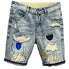 Ankomst sommar tvättade mens casual denim shorts elegant katt whiskercowboy rippade nödställda lappade mager korta jeans 240410