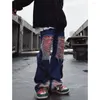 Pantalon masculin de style américain Hip Hop Skateboard Straight décontracté jeans lâches High Street Hole Patch Typers