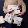 Umhängetaschen vierköpfige Mutter und Sohn Packung koreanischer Eimer Quaste Women's Bag Ladies Messenger Handphone Geldbörse Wild