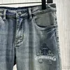 2024 Spring Autumn Embroidery Print dragkedja Mäns jeans rippade lätt tvättade mans långa pennbyxor WCNZ066