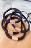 Whole Designer Fashion Luxury elastic hair ties band hair rope bracelets headband Ornament with metal Buckle accessories6023243