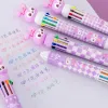 Stylos 20pcs / lot mignon dessin animé lapin violet 10 couleurs pins stylos à balle multi-couleurs stylo graffiti