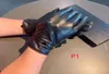 Mężczyźni Women Designer Rękawiczki zima luksus czarne oryginalne skórzane rękawiczki marki palce rękawiczki ciepłe kaszmirowe kaszmirowe ekran dotykowy Mitte8981251