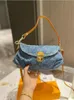 24SS Designer'ın yeni Tengg desen işlemeli eyer çantası, moda bayanlar için olması gereken yüksek kaliteli lüks omuz crossbody el çantasıdır.