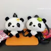 2024New Internet Celebrity Panda Flor Plush Bolsa, mochila de crianças suaves e fofas, presente de aniversário, agarrar uma boneca de máquinas por atacado