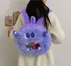 Le nouveau sac à dos perspectif personnalisé Little Monster Perspective pour les filles avec un cours de maquillage de style étranger, un sac d'étudiant, un portefeuille zéro