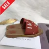 Sandalias leñosas, diseñador de lujo Sandale, 2024 Sandalia para mujer de moda, zapatos de playa de verano, toboganes de tela bajos, deslizadores de mulas femeninas, zapatillas de tendencia