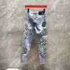2024メンズトレンディブランドのハイエンドの新しいジーンズ重工業用品パーソナライズされたプリント水洗浄された弾性スリムフィットスモールフィートパンツプリント
