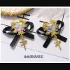 Decalques 50pcs japoneses Butterfly Ribbon Crystal UNIGH CARMOS DE PERNOS 3D CORAÇÃO DE DIAMAÇÃO PARA NEWS Acessórios de design de manicure de arte 1.5*2,8cm
