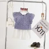 Ensembles de vêtements 2024 Enfants de mode d'été Girls Imprimé à la fleur florale Flow Flying Sleve T-Shirts + Shorts blancs 2pcs Vêtements Set Y240412