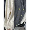 女性用セーターC23秋/冬のファッションメタルツイストボタン装飾気質多用途のスリムニットカーディガン