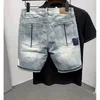 Ripped denim shorts mens light blue fifth pants trendy allmatch loose woolen Mens split stitching short jeans 240409