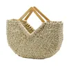 Shengjie Craft New Handheld Moon Bag Handheld Grass Woven Bag Beach Woven Bag 240412