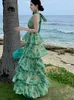 Sıradan elbiseler kadınlar yaz moda çiçek yeşil baskı yular papyon yaka sırtsız katmanlı uzun tatil