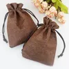 Enveloppe cadeau de haute qualité 100 pcs / lot rose mini pochette de jute en linge de petit sac d'emballage bijoux de mariage (7x9 cm)