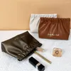 Bolsas de cosméticos colorido sólido PU Leaf Spring Bag criativo armazenamento autônomo de um item pequeno de estilo coreano ao ar livre