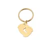 Nyckelringar 10st / parti spegel polerat rostfritt stål Key Chain Small Foot Pendant Key Chain Fashion Creative Gift 240412